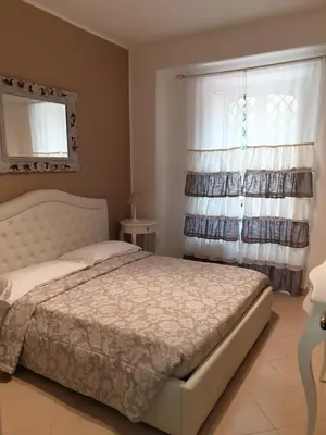 Letto o letti in una camera di Dimoramuri B&B