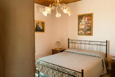 Letto o letti in una camera di Etna Dimora dei Saponari