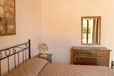 Letto o letti in una camera di Etna Dimora dei Saponari