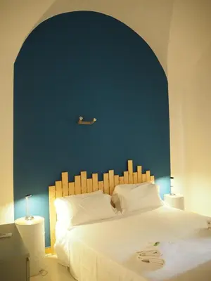 Letto o letti in una camera di Tambù Apartments