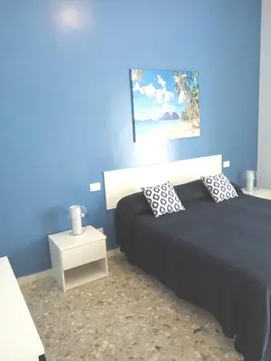 Letto o letti in una camera di Michelangelo Rooms