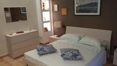 Letto o letti in una camera di Casa Vacanze Prato Verde