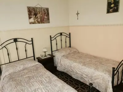 Letto o letti in una camera di I Mici di Emy