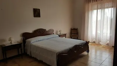 Letto o letti in una camera di Tra L'Etna e il Mare
