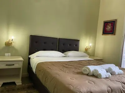 Letto o letti in una camera di Umberto House Catania