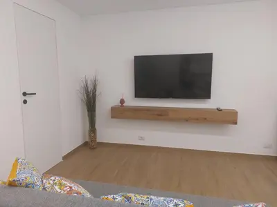 TV o dispositivi per l'intrattenimento presso GiglioApartment Etna Mare