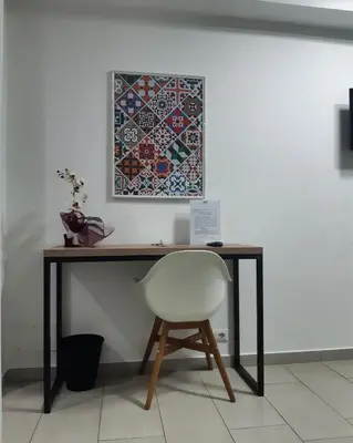 TV o dispositivi per l'intrattenimento presso GiglioApartment Etna Mare