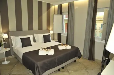 Letto o letti in una camera di ETNEA 454 Catania Luxury Rooms