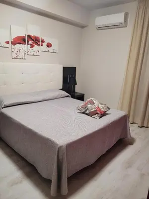 Letto o letti in una camera di Hotel Casale dei Greci