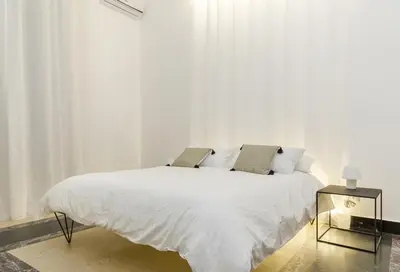 Letto o letti in una camera di B&B 4 ELEMENTI CATANIA