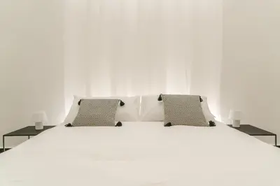Letto o letti in una camera di B&B 4 ELEMENTI CATANIA