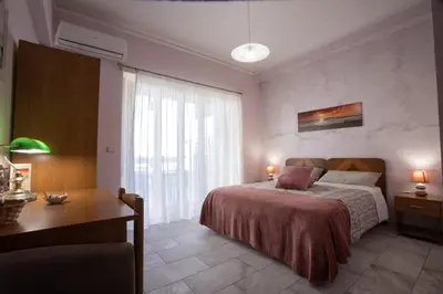 Letto o letti in una camera di Etna Sea House