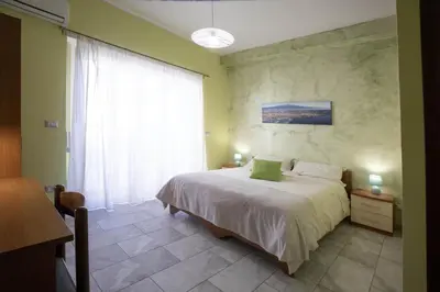 Letto o letti in una camera di Etna Sea House