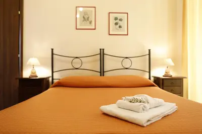 Letto o letti in una camera di B&B Del Corso