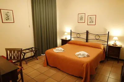 Letto o letti in una camera di B&B Del Corso