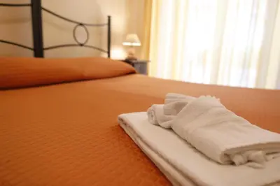 Letto o letti in una camera di B&B Del Corso