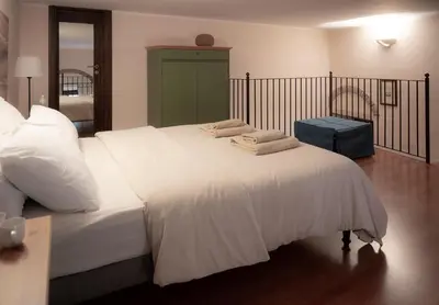 Letto o letti in una camera di Etna Home