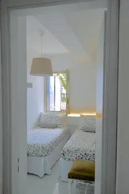Letto o letti in una camera di Villa Alba