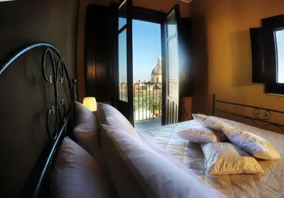 Letto o letti in una camera di AltoBarocco House