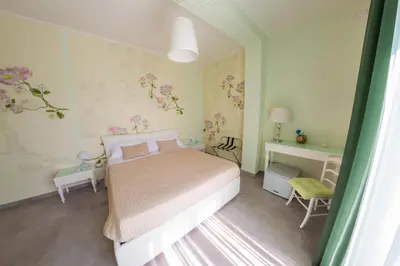 Letto o letti in una camera di B&B Attico 160