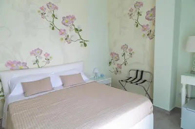 Letto o letti in una camera di B&B Attico 160