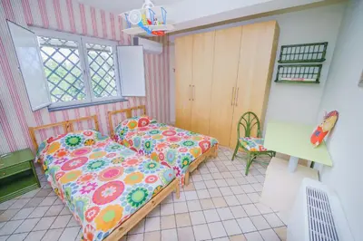 Letto o letti in una camera di villa dei limoni Etna-mare
