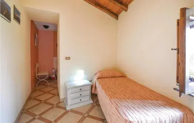 Letto o letti in una camera di La Perla