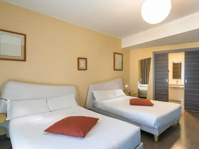 Letto o letti in una camera di ibis Styles Catania Acireale