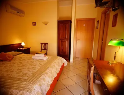 Letto o letti in una camera di B&B Casalotto Inn