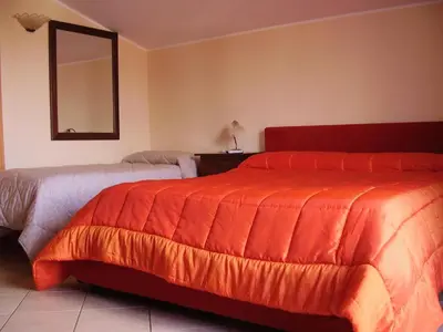 Letto o letti in una camera di B&B Casalotto Inn