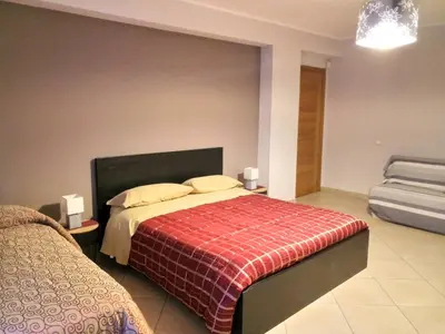 Letto o letti in una camera di Villa Feluchia Tra Il Mare E Il Vulcano