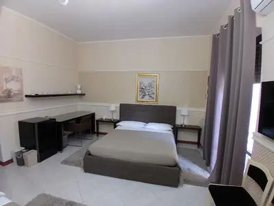 Letto o letti in una camera di La Suite del Vulcano