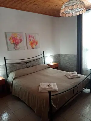 Letto o letti in una camera di Casa Maya Ognina Sea casa indipendente Catania