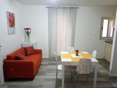 Area soggiorno di Vittoria apartment