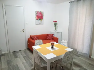 Area soggiorno di Vittoria apartment