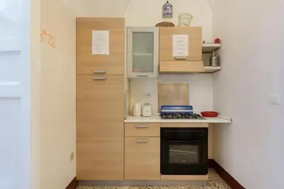 Cucina o angolo cottura di Da Gianni e Lucia Rooms with bathroom in the city center