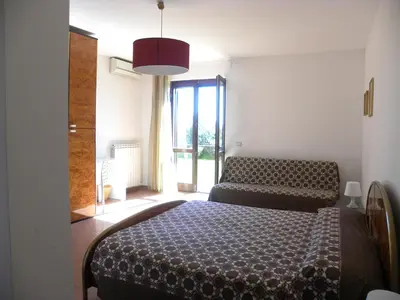 Letto o letti in una camera di Poggio Sambuco