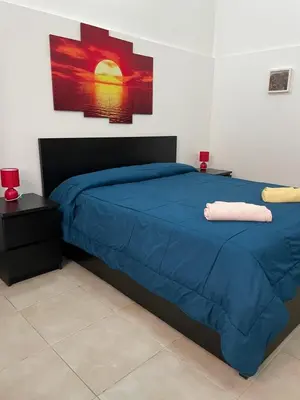 Letto o letti in una camera di La Maison di Angela