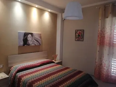Letto o letti in una camera di La perla di nicolosi