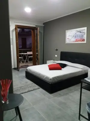 Letto o letti in una camera di B&B La Grotta