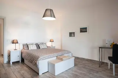 Letto o letti in una camera di Villa Ginevra