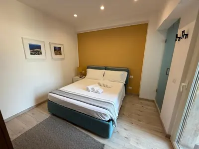 Letto o letti in una camera di Casa Vitale