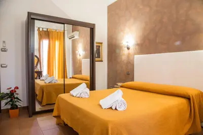 Letto o letti in una camera di Antichi Ricordi