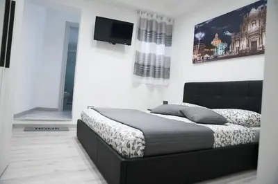 Letto o letti in una camera di Tourist's home