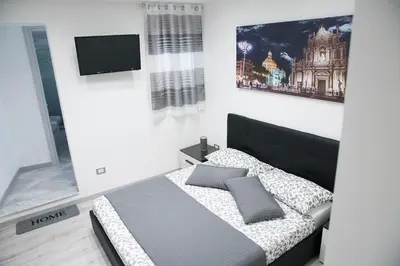 Letto o letti in una camera di Tourist's home