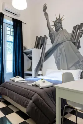 Letto o letti in una camera di Giro nel mondo