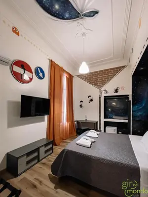 Letto o letti in una camera di Giro nel mondo