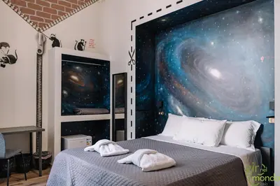 Letto o letti in una camera di Giro nel mondo