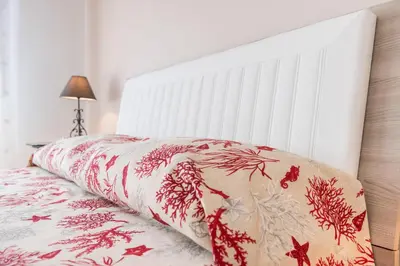 Letto o letti in una camera di La Castellese