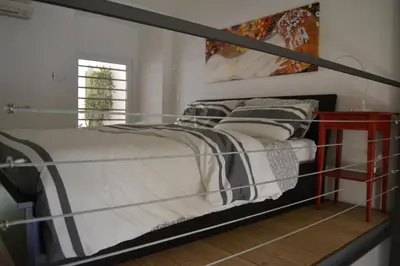 Letto o letti in una camera di Casa Giuffrida